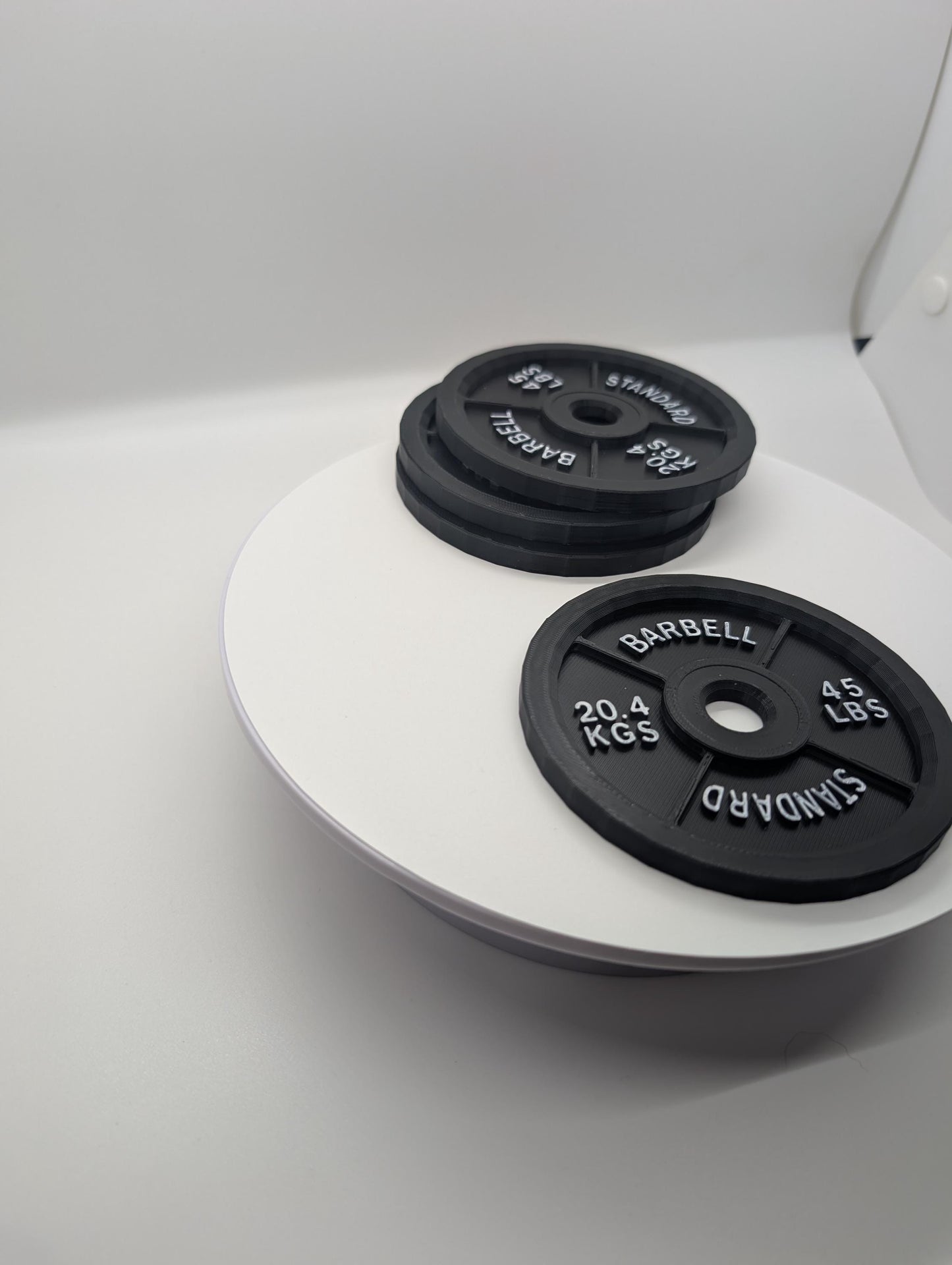 Barbell Coaster set of 4 drink coasters. Perfect for gym office.