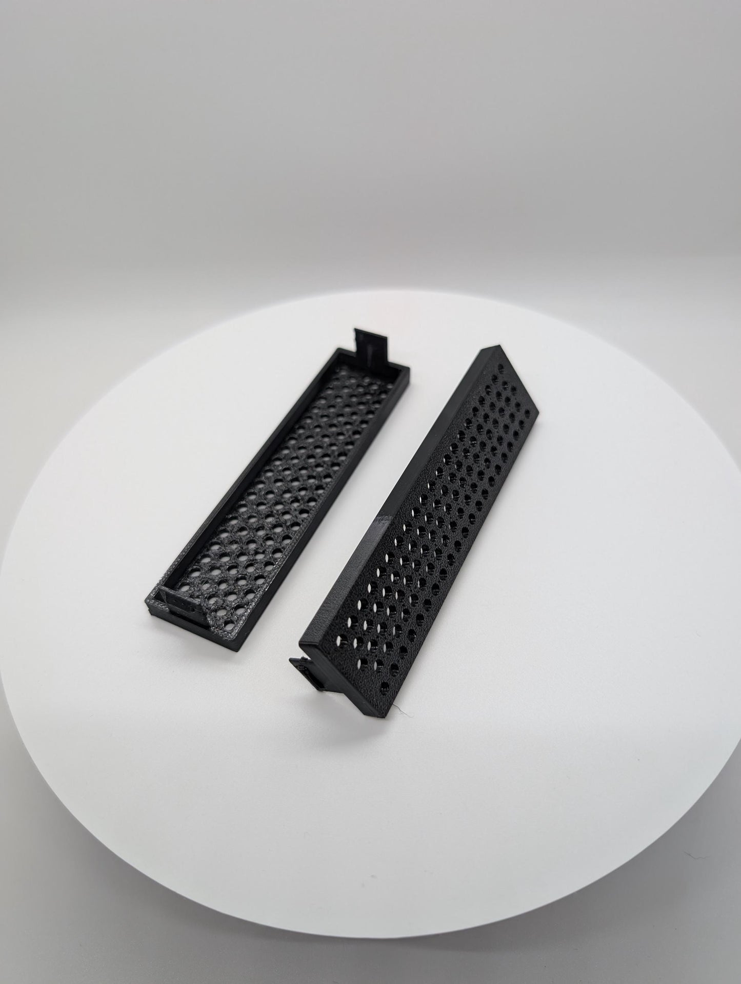2x - 3.5 inch disk drive bay cover holes - circles . black replacement computer tower parts.