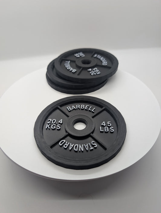 Barbell Coaster set of 4 drink coasters. Perfect for gym office.