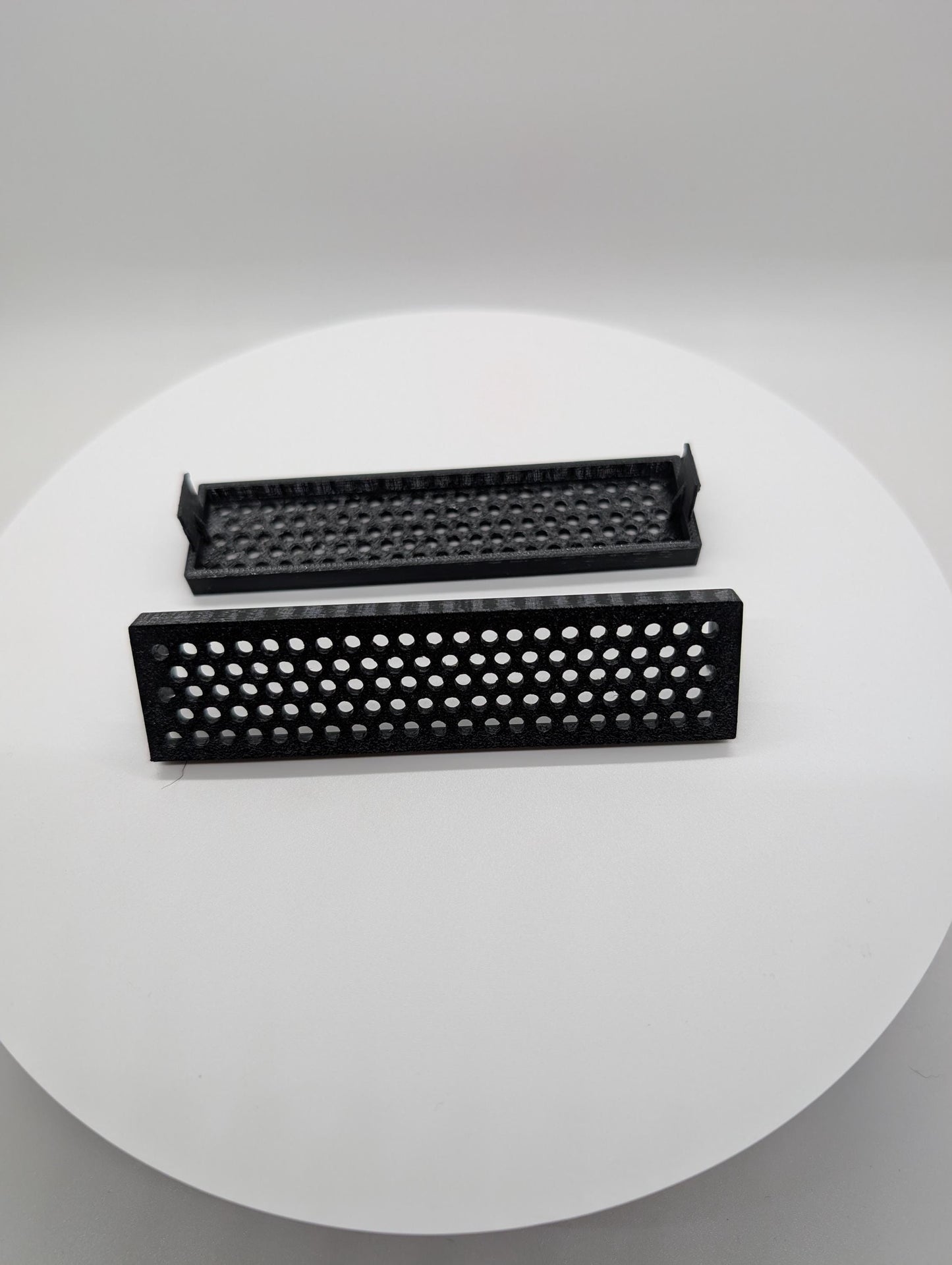 2x - 3.5 inch disk drive bay cover holes - circles . black replacement computer tower parts.